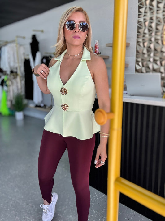 Burgundy full-length leggings with fitted leg silhouette and ankle length