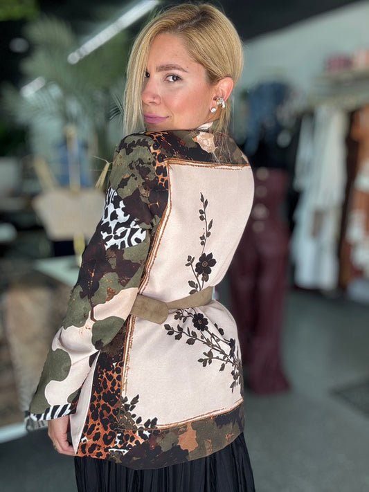 Blazer back with cream floral panel, camouflage and animal-print patchwork, and a waist belt