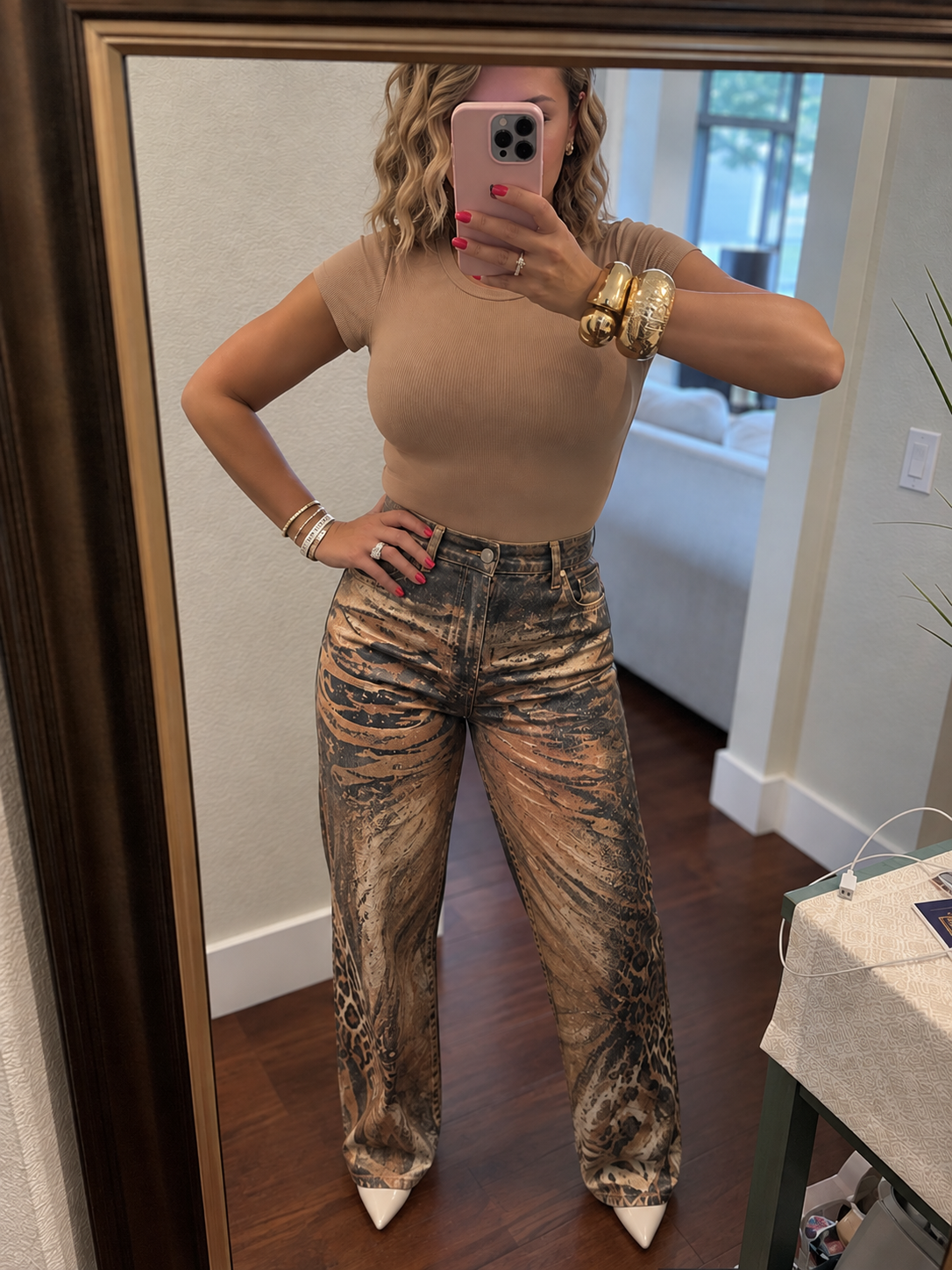 High-rise wide-leg jeans with leopard print in tan and dark brown