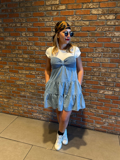 Two-tone light blue dress with white cap sleeves, gathered bodice, and tiered ruffles