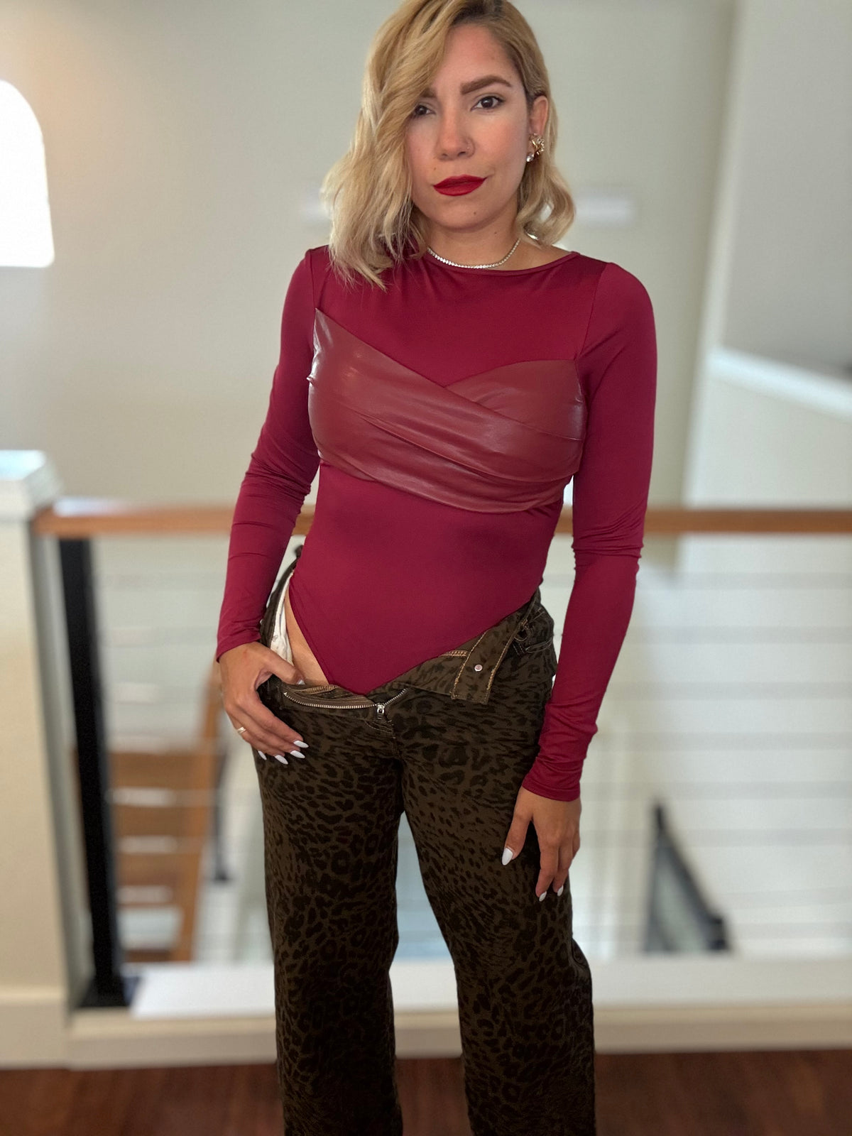Alessandra burgundy long-sleeve bodysuit with ruched faux-wrap chest