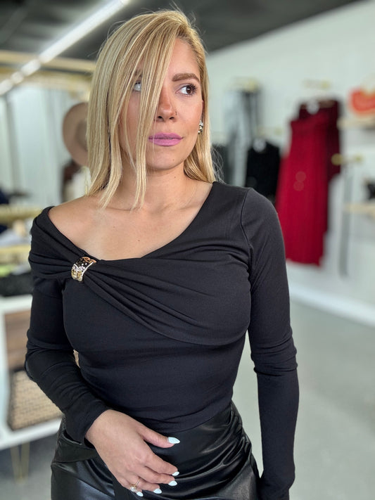 Black Elizabeth Top with wrap-style draped neckline and gold embellishment at bust