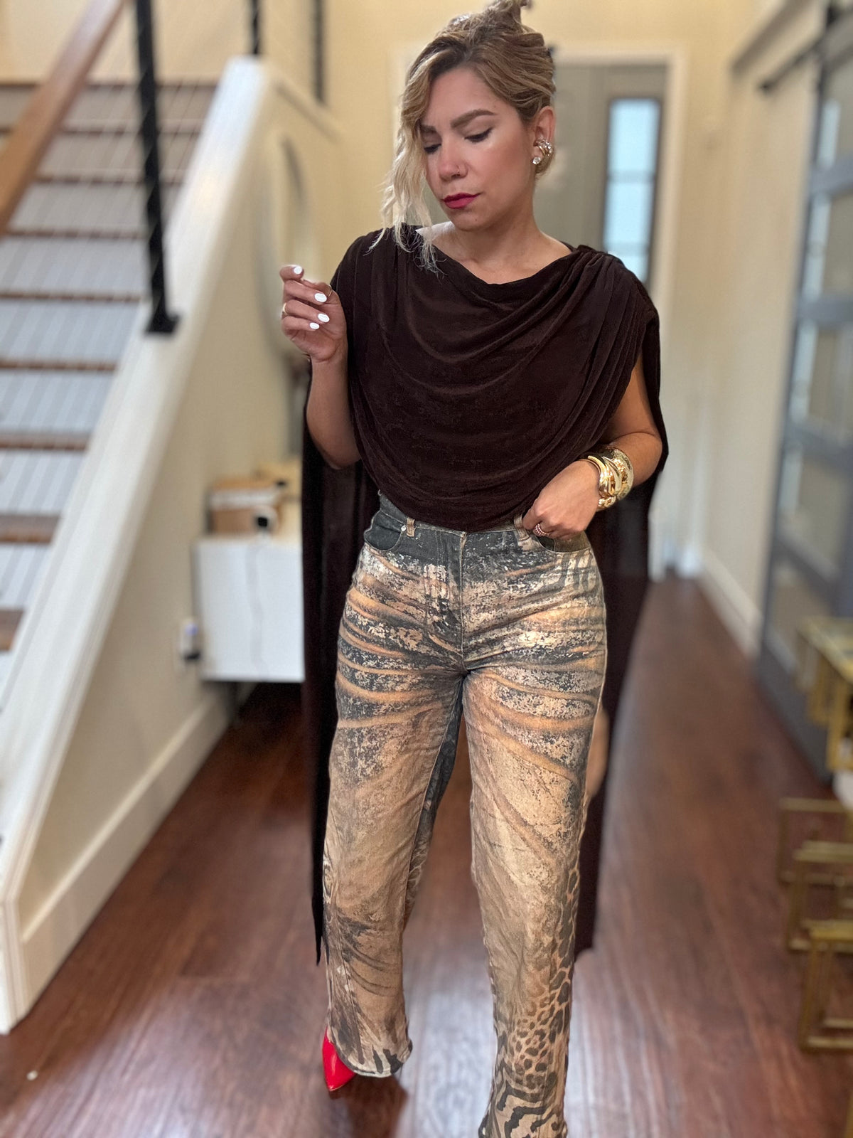 High-rise wide-leg jeans with mottled leopard print in tan and dark brown