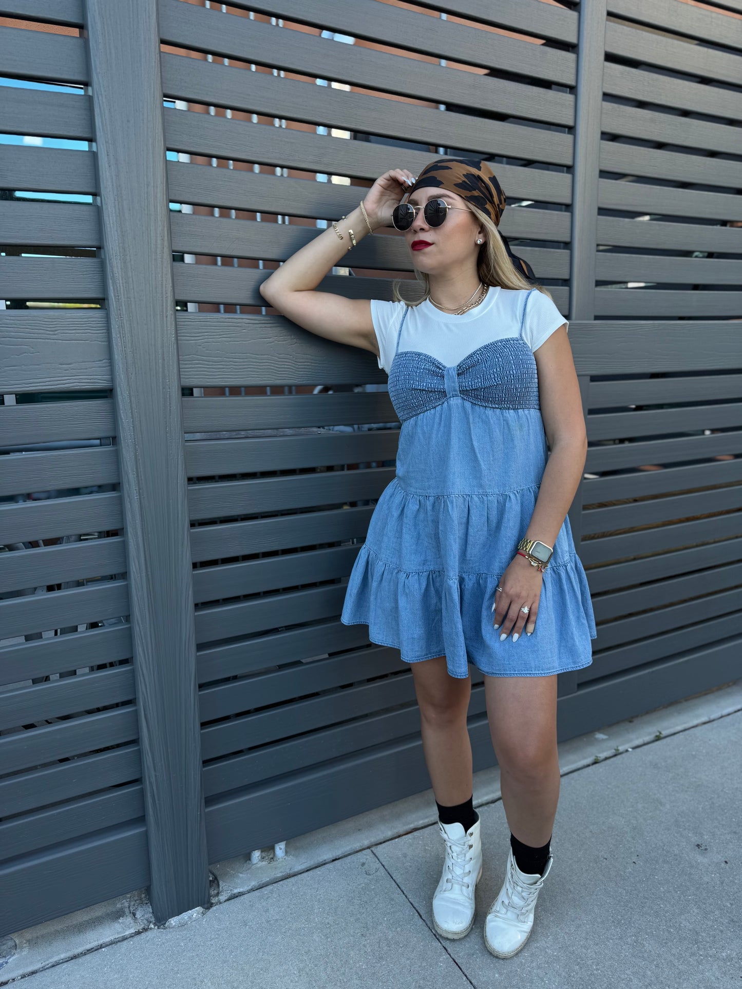 Light blue tiered mini dress with fitted bodice and cap sleeves