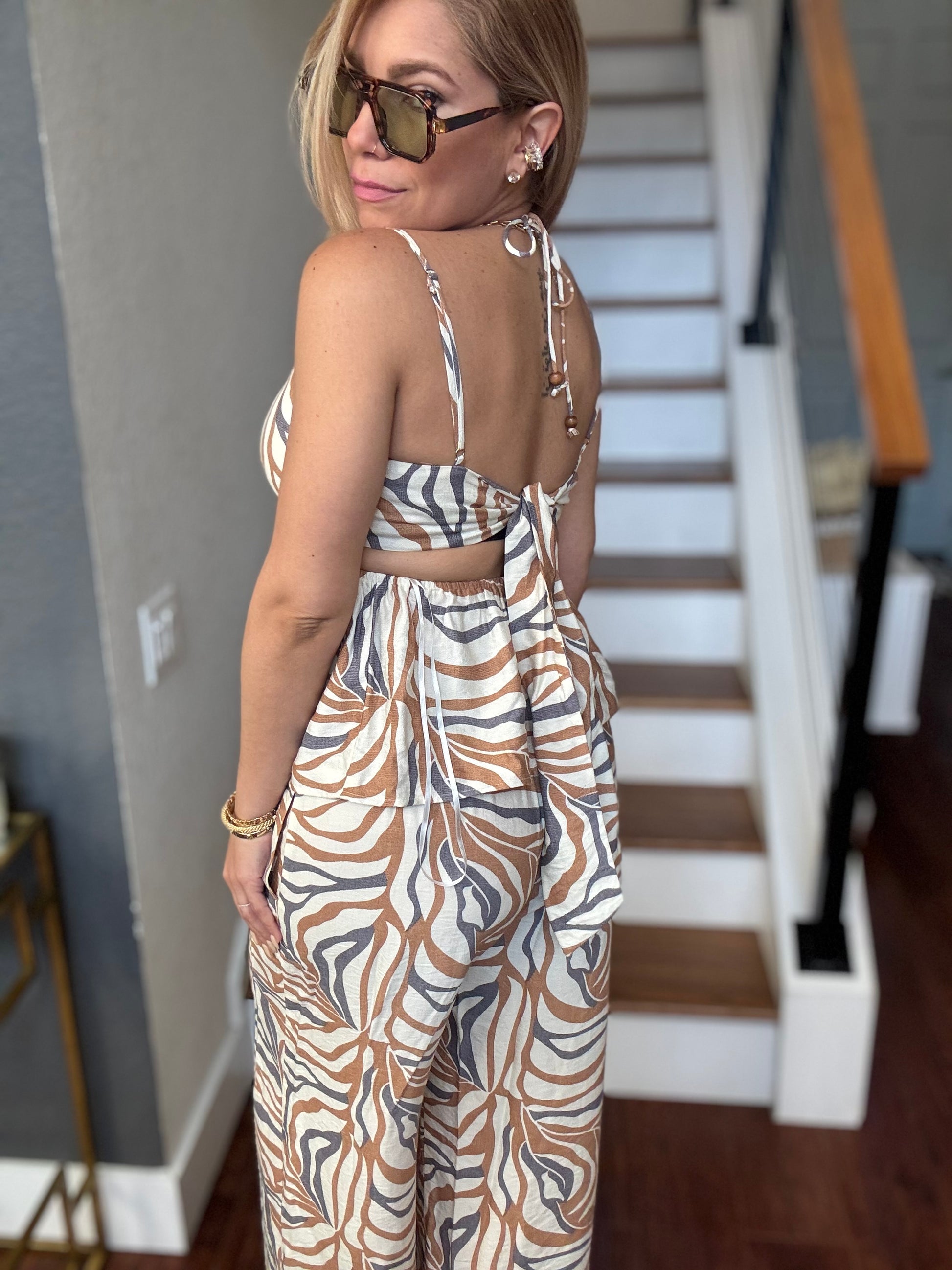 Alicia set sleeveless animal-print jumpsuit with open back and draped waist ties