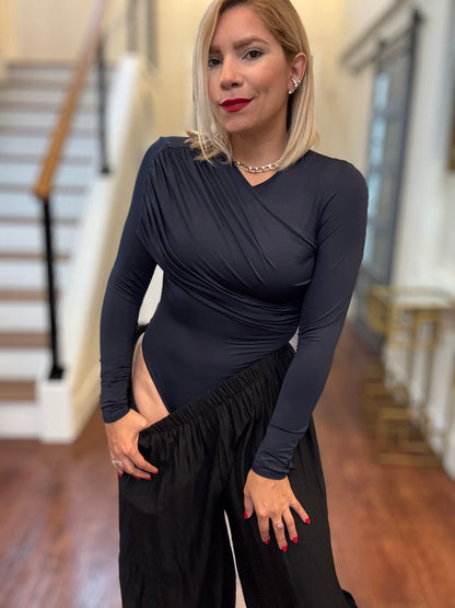 Dark blue long-sleeve bodysuit with wrap V-neck and ruched cross-body seam