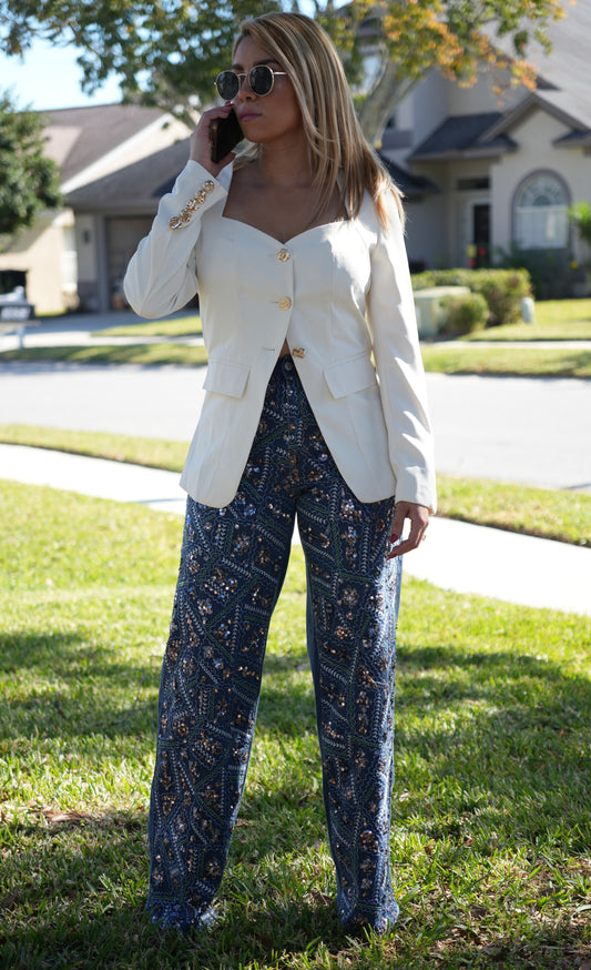 Ivory blazer top with gold button front and patch pockets, long sleeves