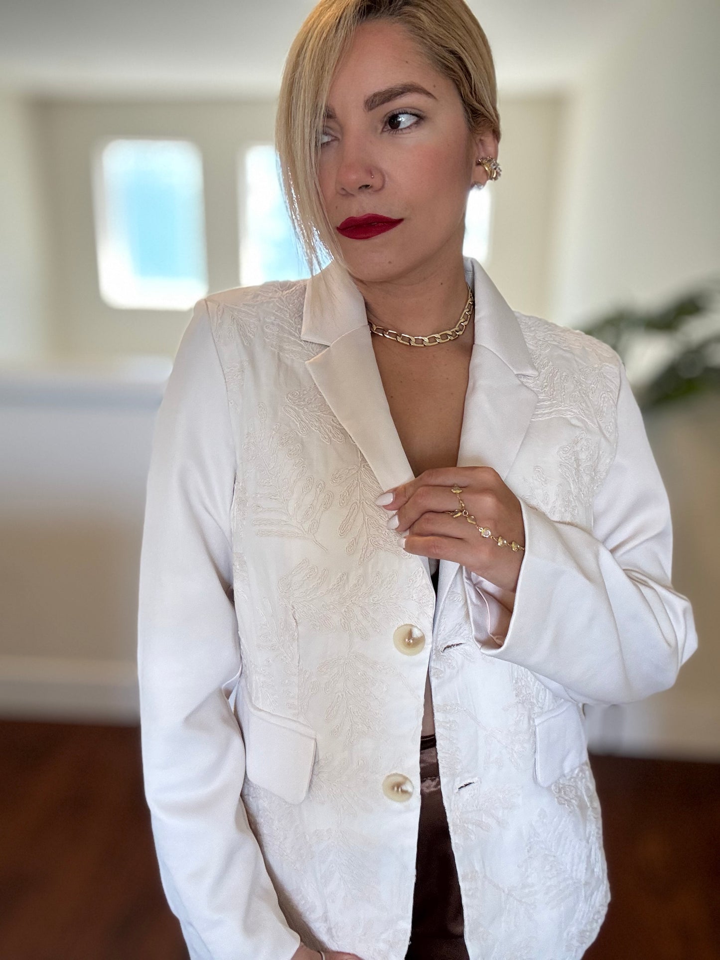 Ivory textured blazer with notch lapel and gold button detail