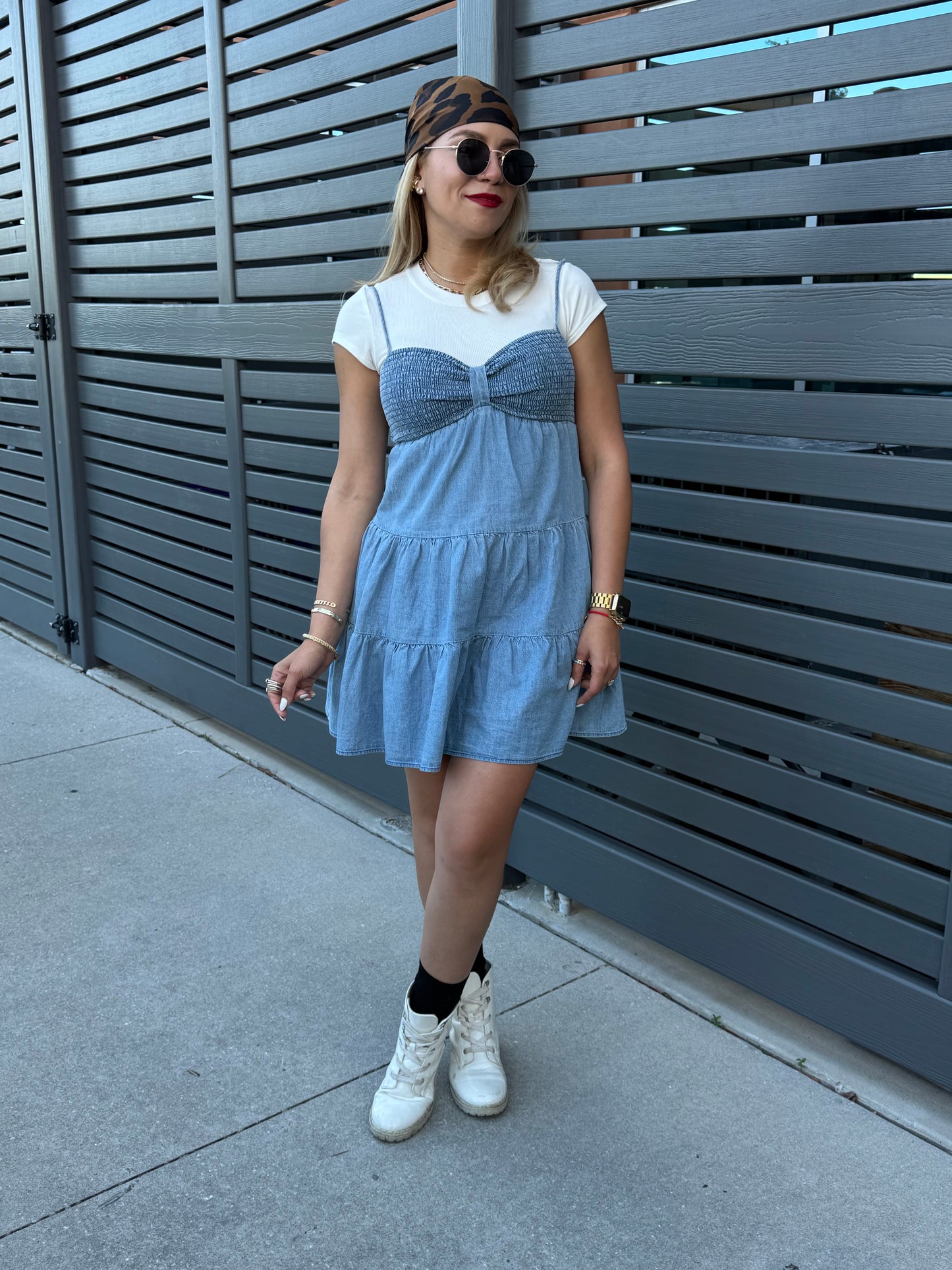 Two-tone light blue dress with white cap sleeves and tiered skirt, full-body front view