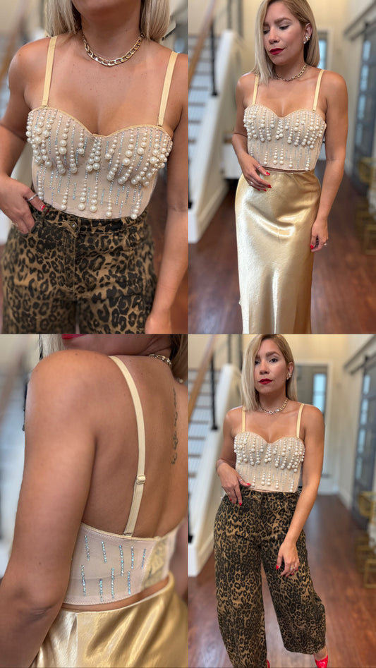Gold satin midi skirt, close-up view of waistband and smooth drape