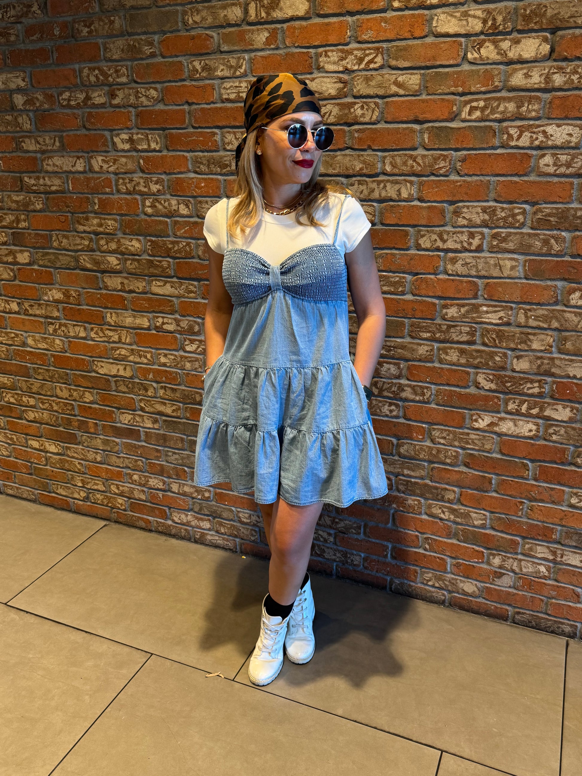Two-tone light blue dress with white cap sleeves and fluttery tiered skirt, front angle
