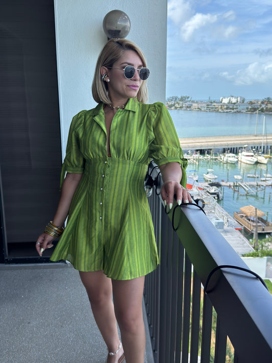 Green striped romper with collar, short sleeves, and tied waist