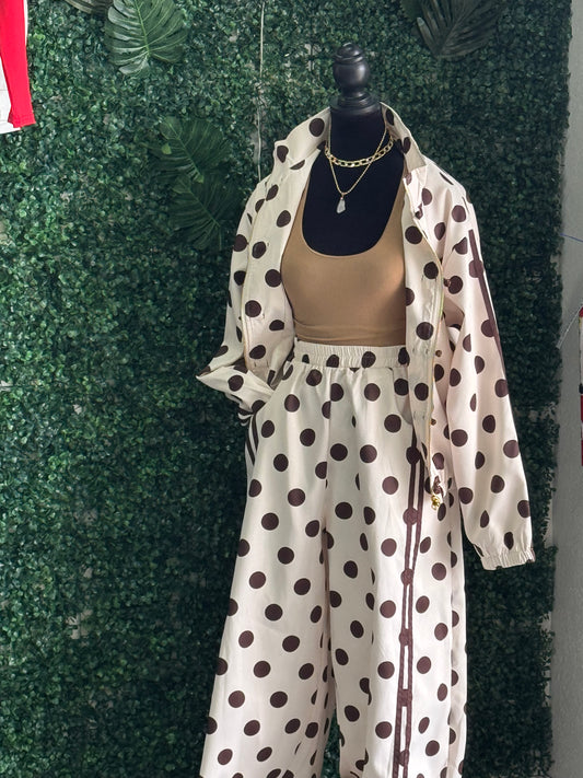Women’s polka-dot travel set on mannequin: jacket and dress-like set, white with dark dots