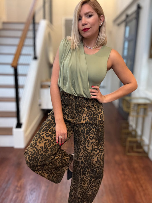 Light green sleeveless bodysuit with scoop neck and draped front
