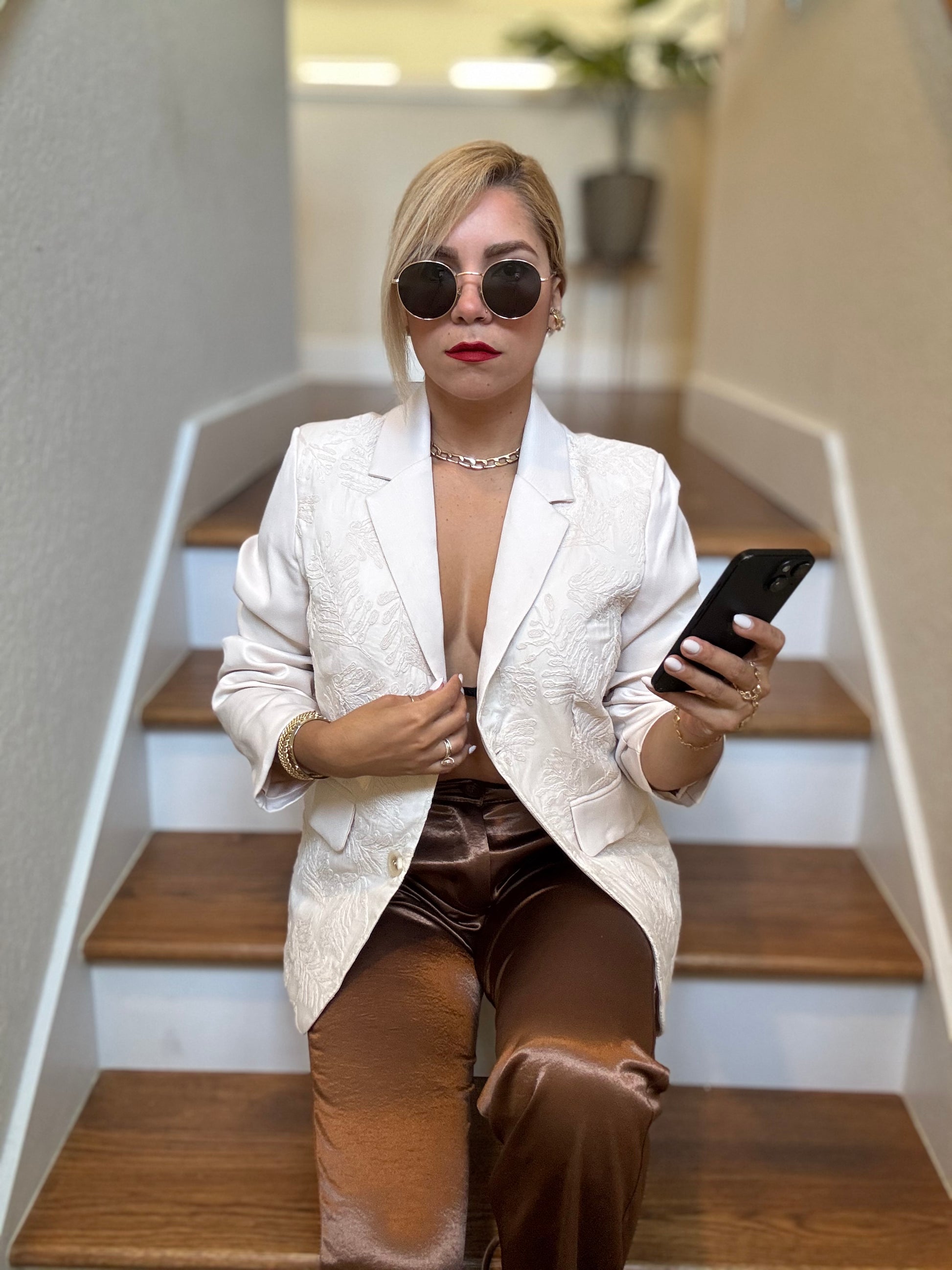 Ivory textured blazer with notch lapels and gold-button front