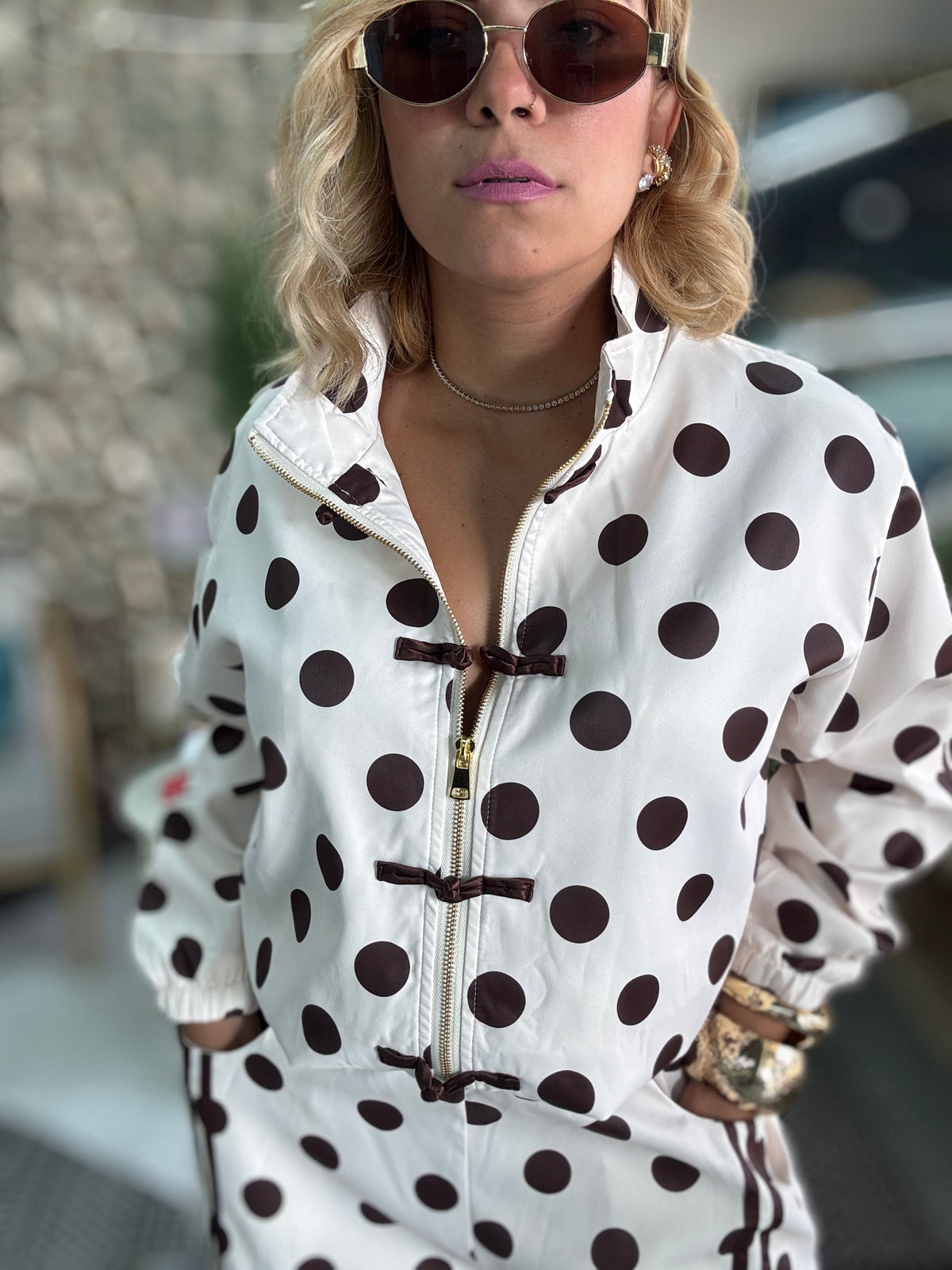 Women’s polka-dot travel set close-up of jacket with button placket, white with dark dots