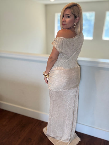 Gold one-shoulder fitted maxi dress viewed from back three-quarter with draped waist