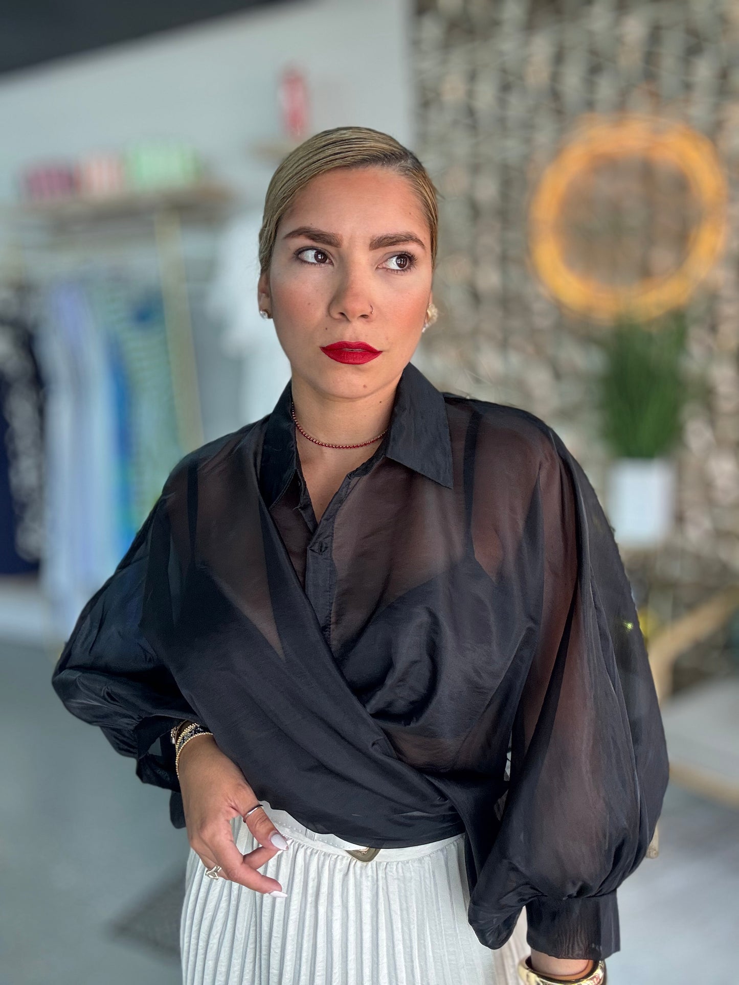 Black sheer button-front blouse top with pointed collar and long sleeves