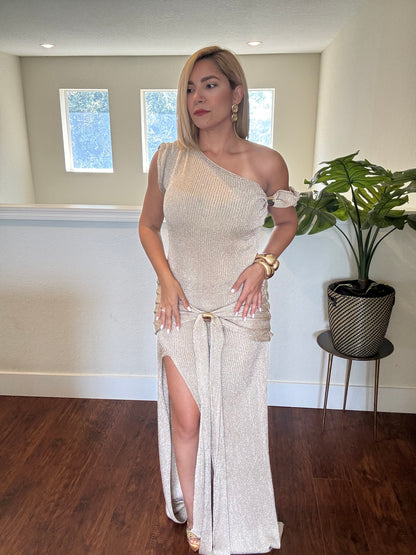 Shimmering metallic gold one-shoulder maxi dress with side slit and waist tie