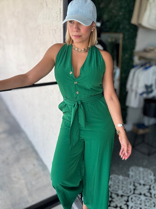 Emerald green sleeveless jumpsuit with button front and cinched waist, wide legs