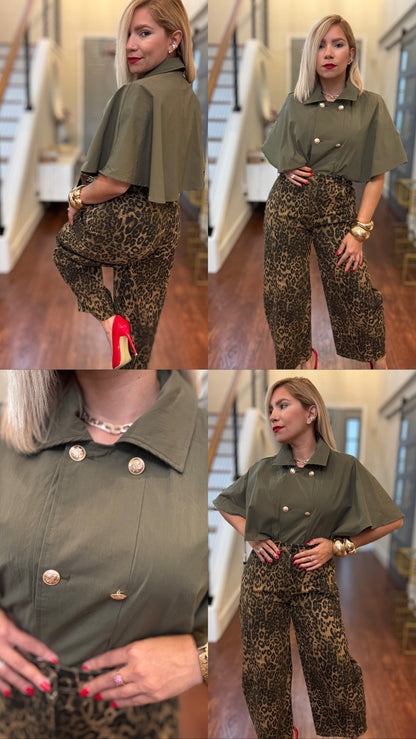 Olive green cape-style top with short sleeves and decorative coin button front