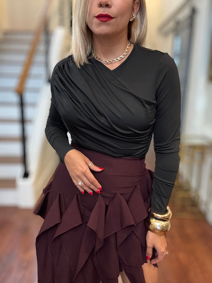 Black long-sleeve bodysuit with draped V-neck and side ruching detail