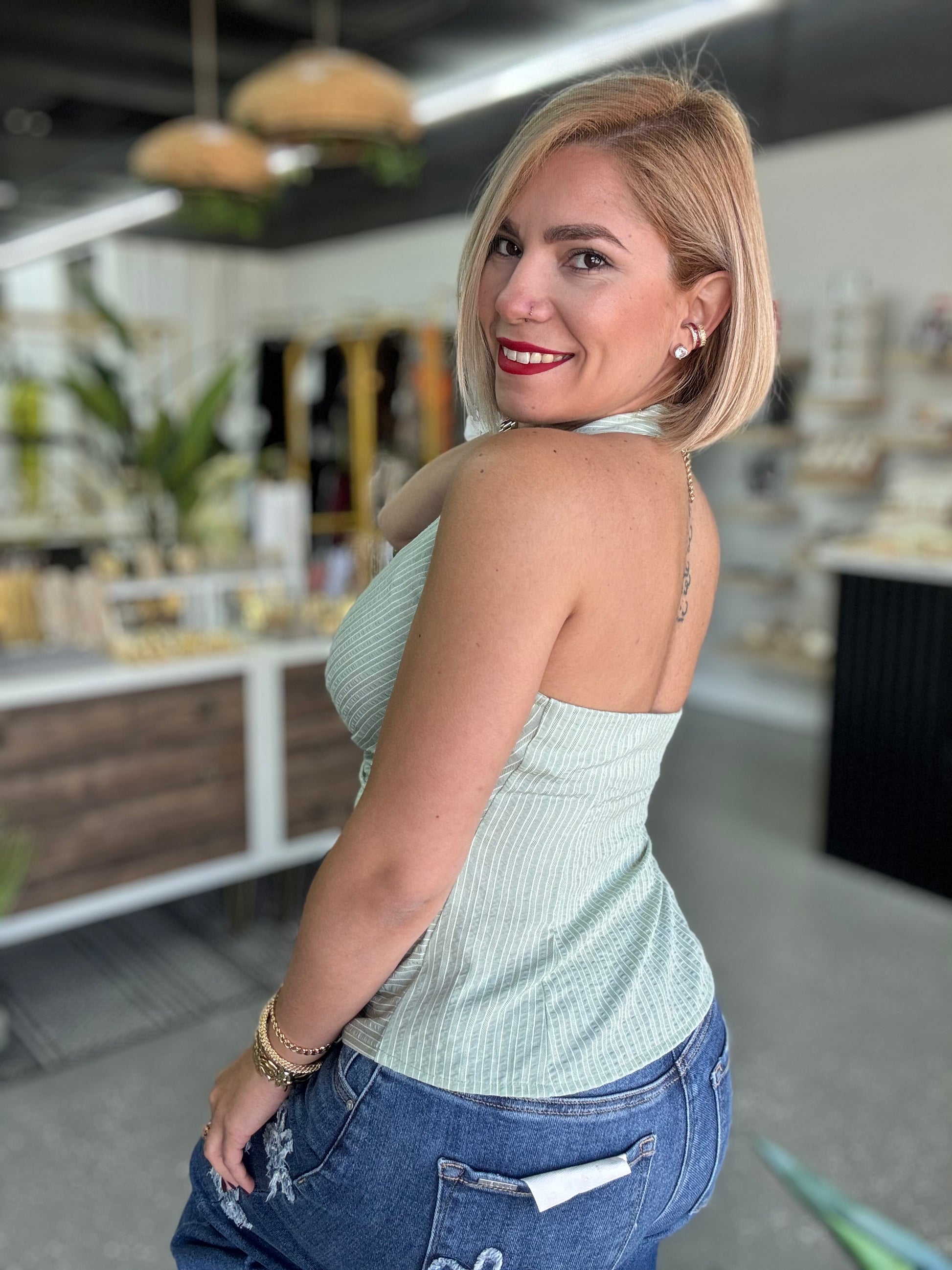 Light green halter top with V neckline and open back
