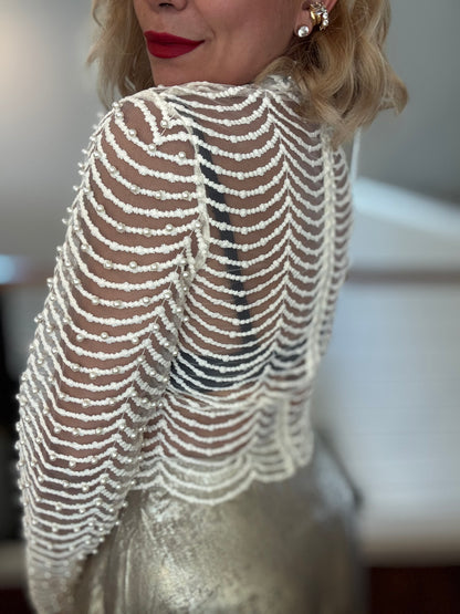 Isadora Perls top close-up in bone white, pearl-striped long sleeve with mock neck