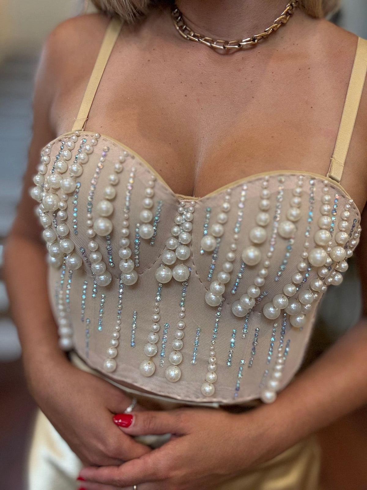 Pearl-beaded heart bustier with dangling bead fringe and thin spaghetti straps, nude base