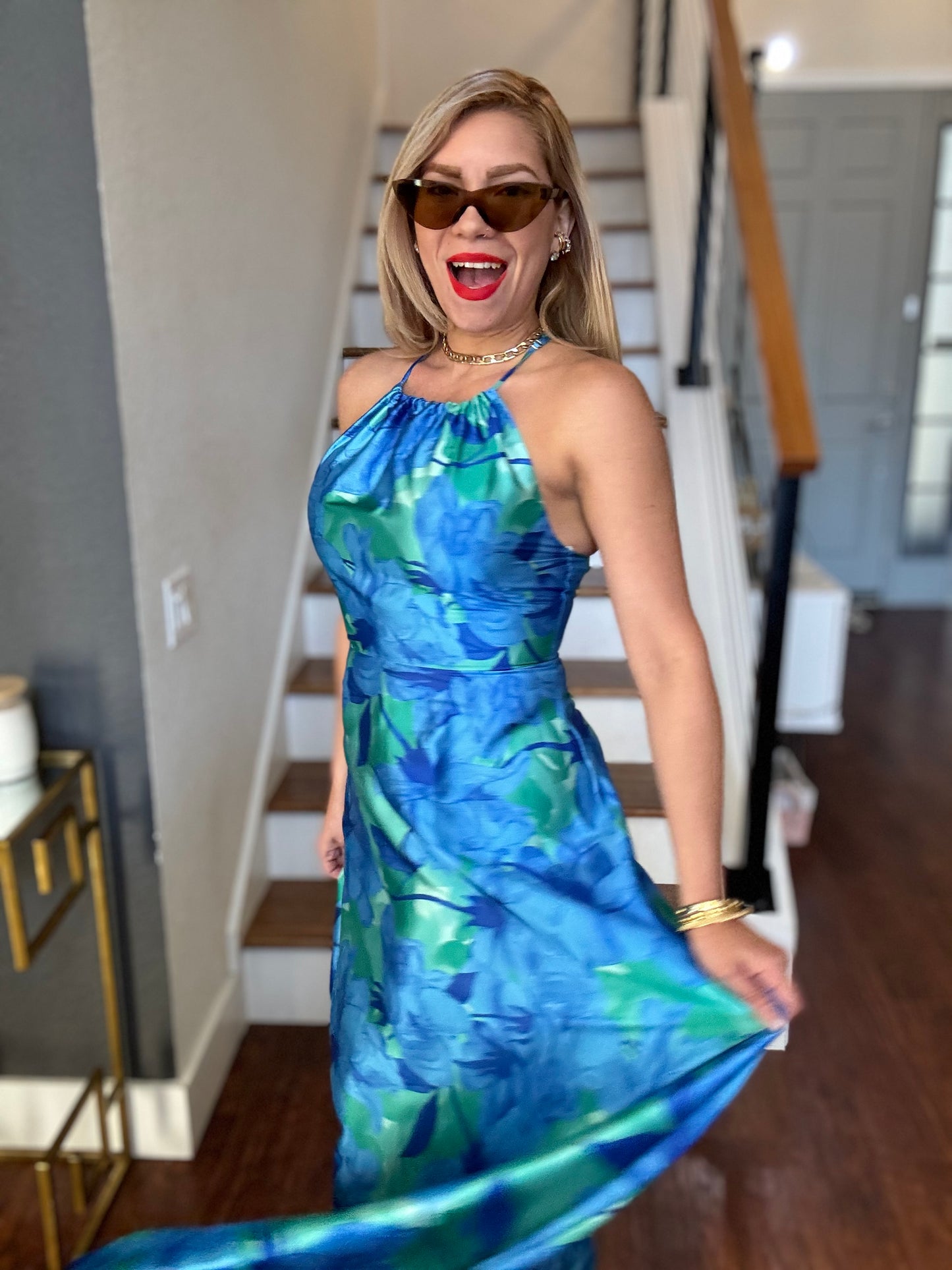 Santorini maxi dress, blue-green floral halter neckline, sleeveless, flowing maxi