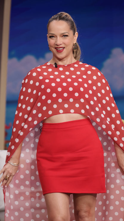 Red polka-dot long-sleeve mini skirt set with draped high-neck top and fitted skirt