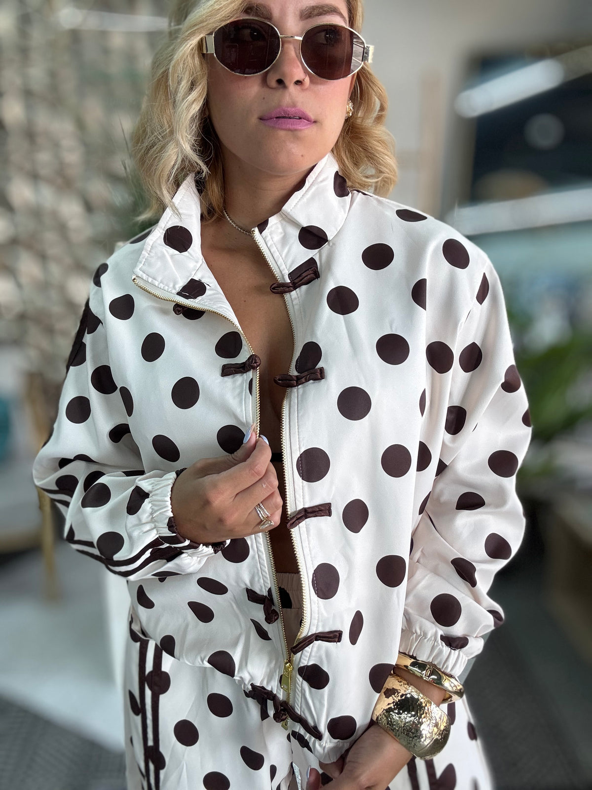 Women’s polka-dot travel set jacket with toggle trim and long sleeves, white/dark dots
