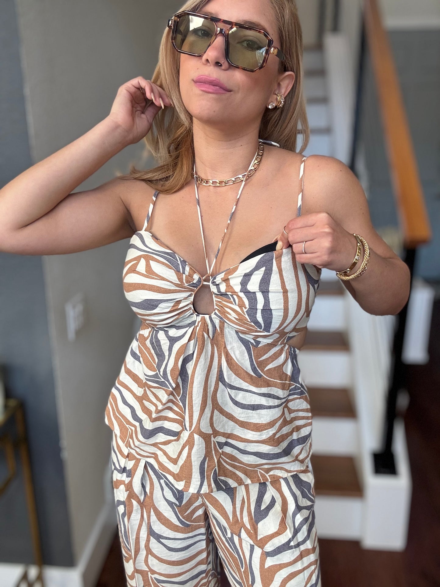 Alicia set sleeveless animal-print jumpsuit with bow-front bodice and layered straps