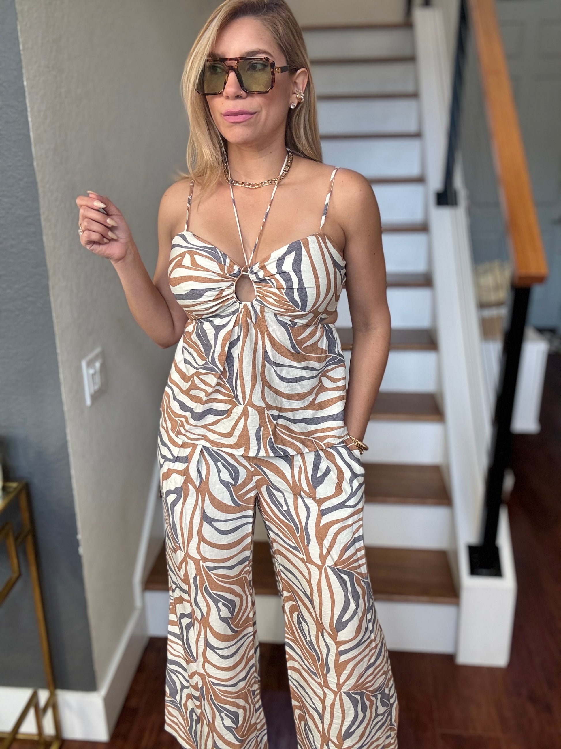 Alicia set sleeveless animal-print jumpsuit with bow-front neckline and wide-leg pants