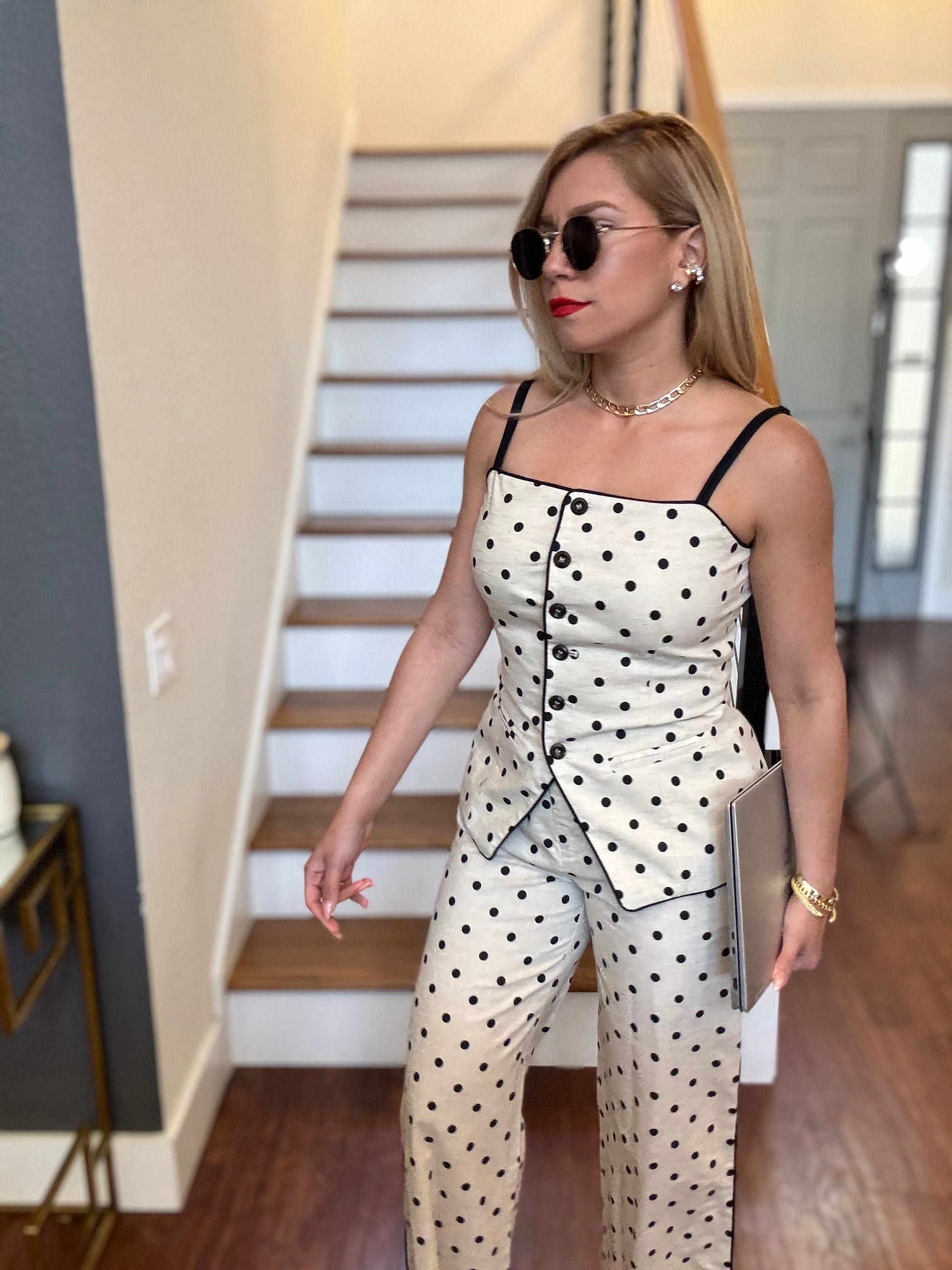 Polka dot camisole and pants set with thin straps and tiered peplum over matching pants