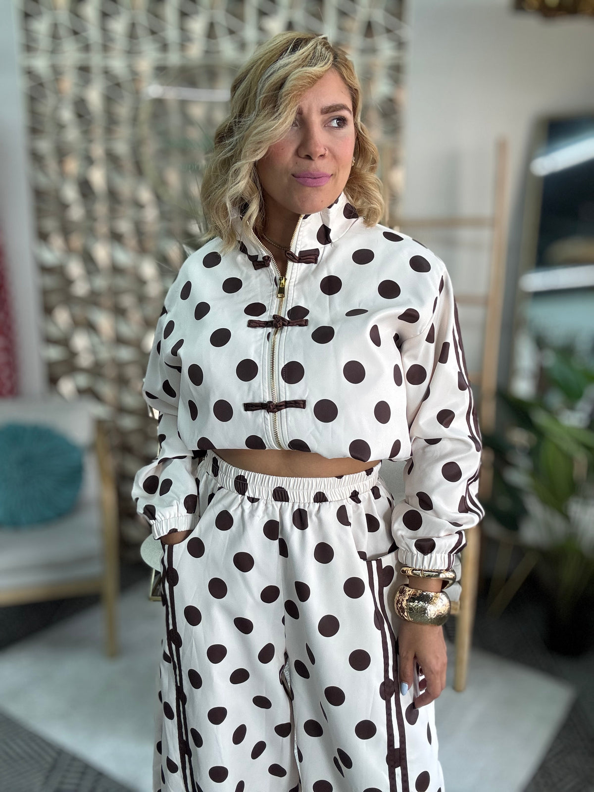 Women’s polka-dot travel set jacket with standing collar and toggle closures, white/dark dots
