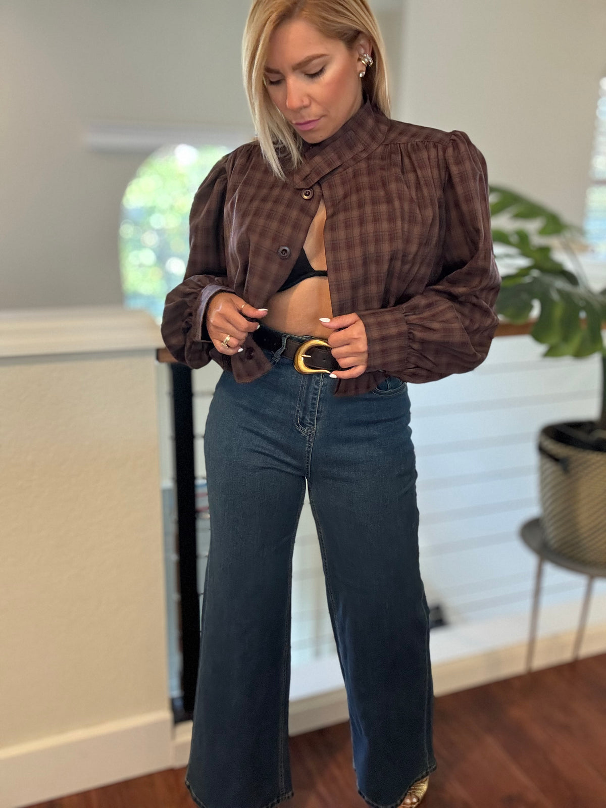 Blue jeans with straight legs, belt loops, and classic 5-pocket styling